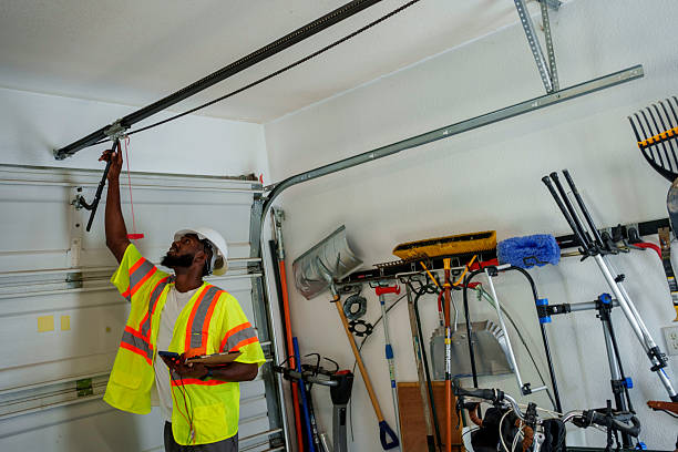 Professional Garage Door Panel Replacement technician working in Chisholm, MN